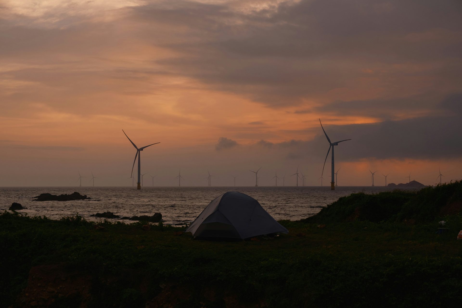 Wind turbines at sunset
